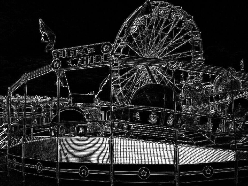 Adapted from  Saskatoon, Canada (Tilt-A-Whirl  Uploaded by SchuminWeb By Daryl Mitchell) [CC BY-SA 2.0 (http://creativecommons.org/licenses/by-sa/2.0)], via Wikimedia Commons